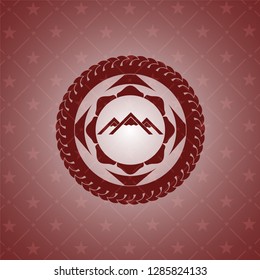 mountain icon inside red emblem. Vintage.