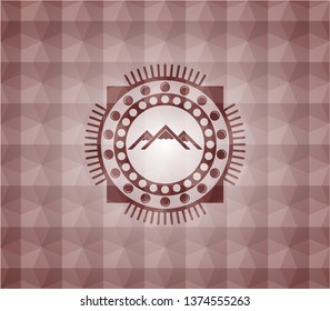 mountain icon inside red seamless emblem or badge with abstract geometric pattern background.