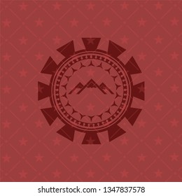 mountain icon inside retro red emblem