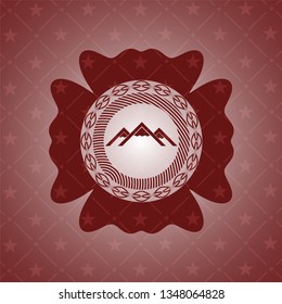 mountain icon inside retro red emblem