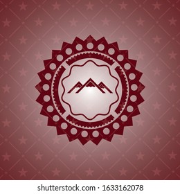 mountain icon inside retro red emblem