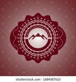 mountain icon inside retro red emblem
