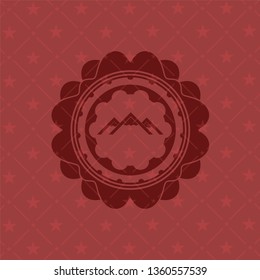 mountain icon inside retro style red emblem