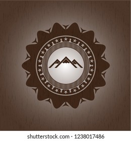 mountain icon inside retro wooden emblem