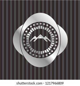  mountain icon inside silver emblem