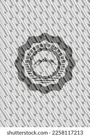 mountain icon inside silver shiny emblem. Scales pattern. Vector Illustration. Detailed. 