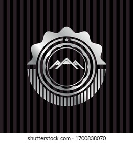 icono de montaña dentro de la placa de plata