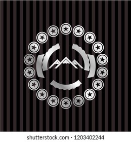 mountain icon inside silvery shiny emblem