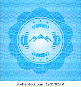 mountain icon inside water concept badge.