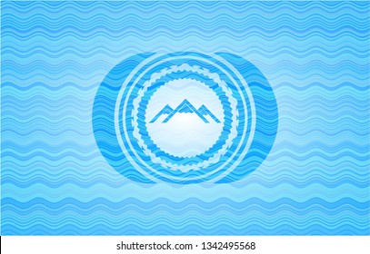 mountain icon inside water concept style badge.