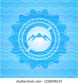 mountain icon inside water wave representation emblem background.