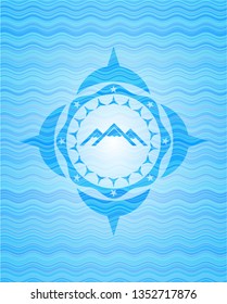mountain icon inside water wave representation emblem background.
