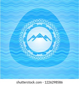 mountain icon inside water wavec oncept emblem.