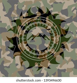 mountain icon on camouflaged pattern