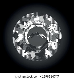mountain icon on grey camo texture