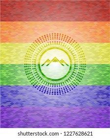 mountain icon on mosaic background with the colors of the LGBT flag
