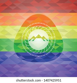 mountain icon on mosaic background with the colors of the LGBT flag