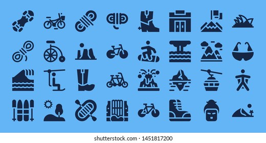 mountain icon set. 32 filled mountain icons. on blue background style Simple modern icons about  - Snowboard, Rope, Tsunami, Ski, Bicycle, Bike, Chairlift, Hill, Canyon, Boots