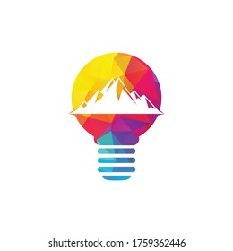 Mountain inside light bulb logo design. Leadership solution logo design. 