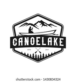 Mountain lake vintage logo with boat element.