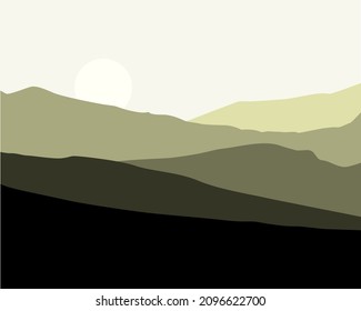 Mountain landscape in gray tones. Mountains at sunset. The white sun is setting behind the mountains. Late autumn, winter, cold.