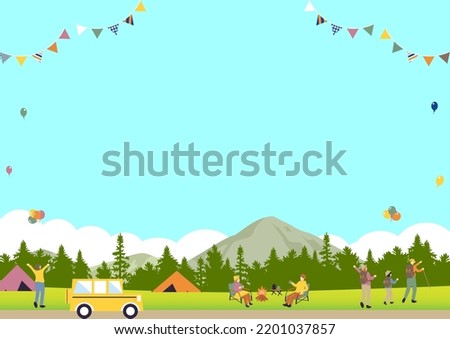 mountain landscape and people enjoying camp fire