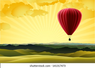 Mountain landscape with red air balloon