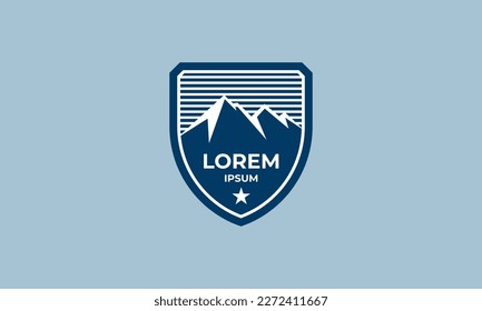 Logo de Montaña en Escudo Azul por Tetusign