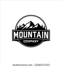 Mountain logo with a circle badge in a classic style design