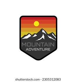 a mountain logo with mountain concept and sunset view