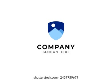 Mountain logo design with shield combination in blue color flat design style