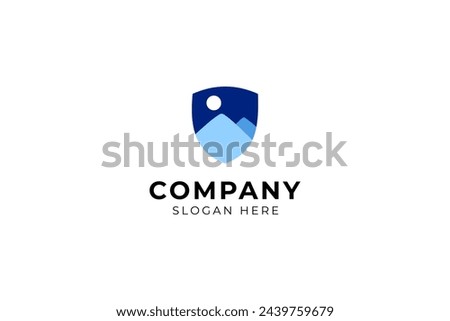 Mountain logo design with shield combination in blue color flat design style