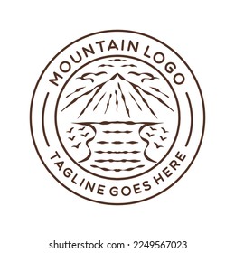 Logo de la montaña Emblem vintage Ilustración de la insignia de diseño del vector Símbolo Icono