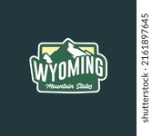 Mountain logo of Wyoming map. Badge vintage illustration design