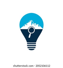 Mountain and loupe bulb shape concept logo combination. Nature and magnifying symbol or icon. Magnifying glass and mountain logo design.