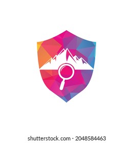 Mountain and loupe logo combination. Nature and magnifying symbol or icon. Magnifying glass and mountain logo design.	