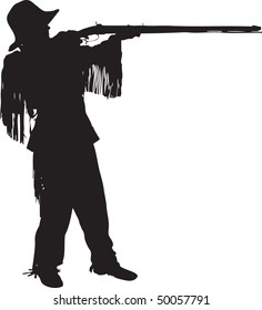 Mountain man shooting his black powder rifle in a silhouette.