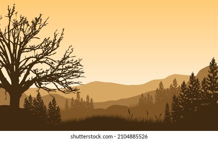 Mountain panorama with a majestic silhouette of pine trees from the out of town at dusk