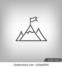 Mountain peak with flag icon