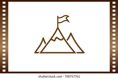 Mountain peak with flag icon