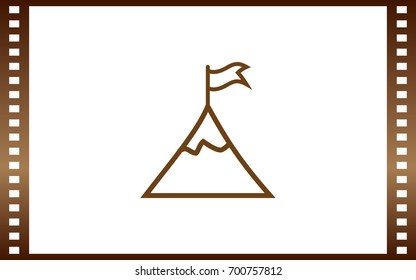 Mountain peak with flag icon
