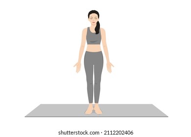 Mountain Pose Palms Facing Forward. Beautiful girl practice Tadasana Palms Facing Forward. Young attractive woman practicing yoga exercise. working out, black wearing sportswear, grey pants and top