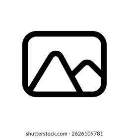 A mountain range is shown in a black and white photo. The mountains are tall and majestic