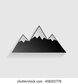 Mountain sign illustration. Black paper with shadow on gray background.