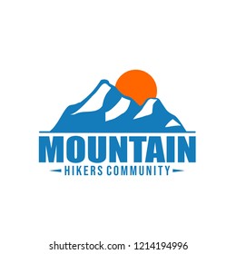 Mountain silhouette with sun behind it represent spirit of freedom and back to nature. Sign of nature lover, adventure, journey or travelers community logo or stamp