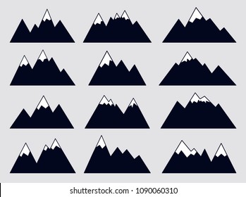 Mountain silhouettes on white background. Set of geometric mountain ridges. Vector black icons with snow on the tops. Outdoor design elements.