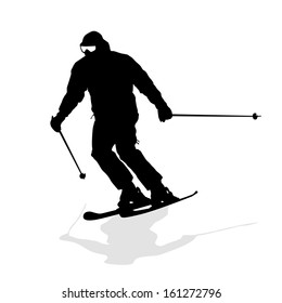 Mountain skier  speeding down slope. Vector sport silhouette.
