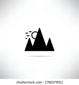 mountain and sun icon with shadow on gray background vector