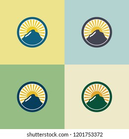 Mountain with sun logo