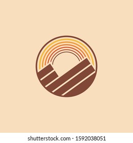 Mountain sunset logo made by two different shapes with sunset color